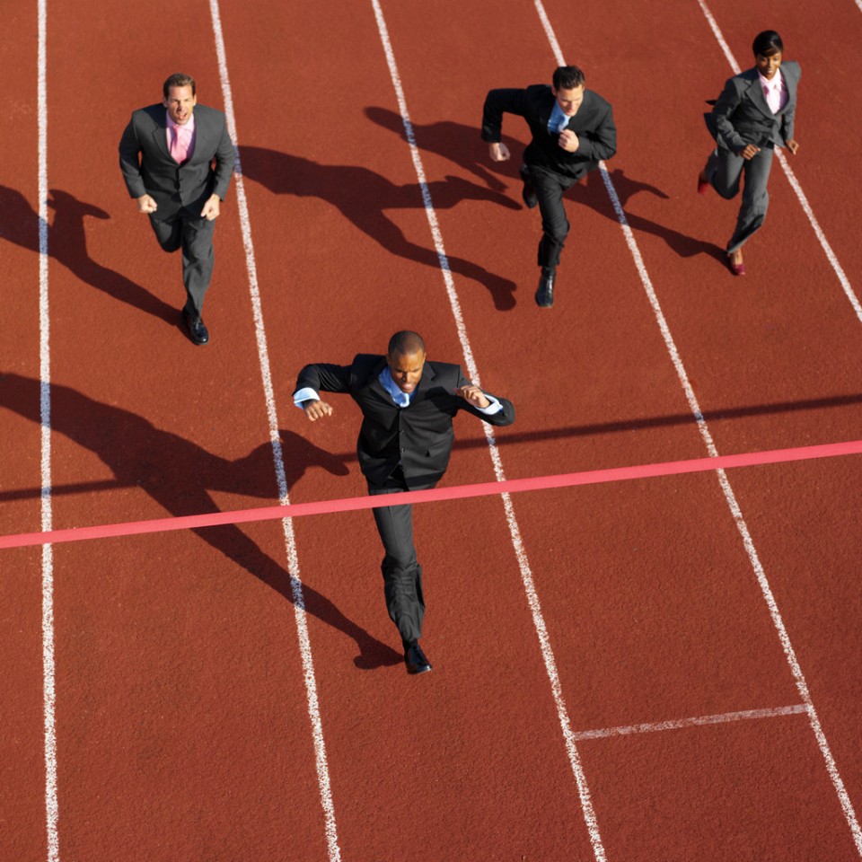 Businessman Winning Race — Image by © Royalty-Free/Corbis